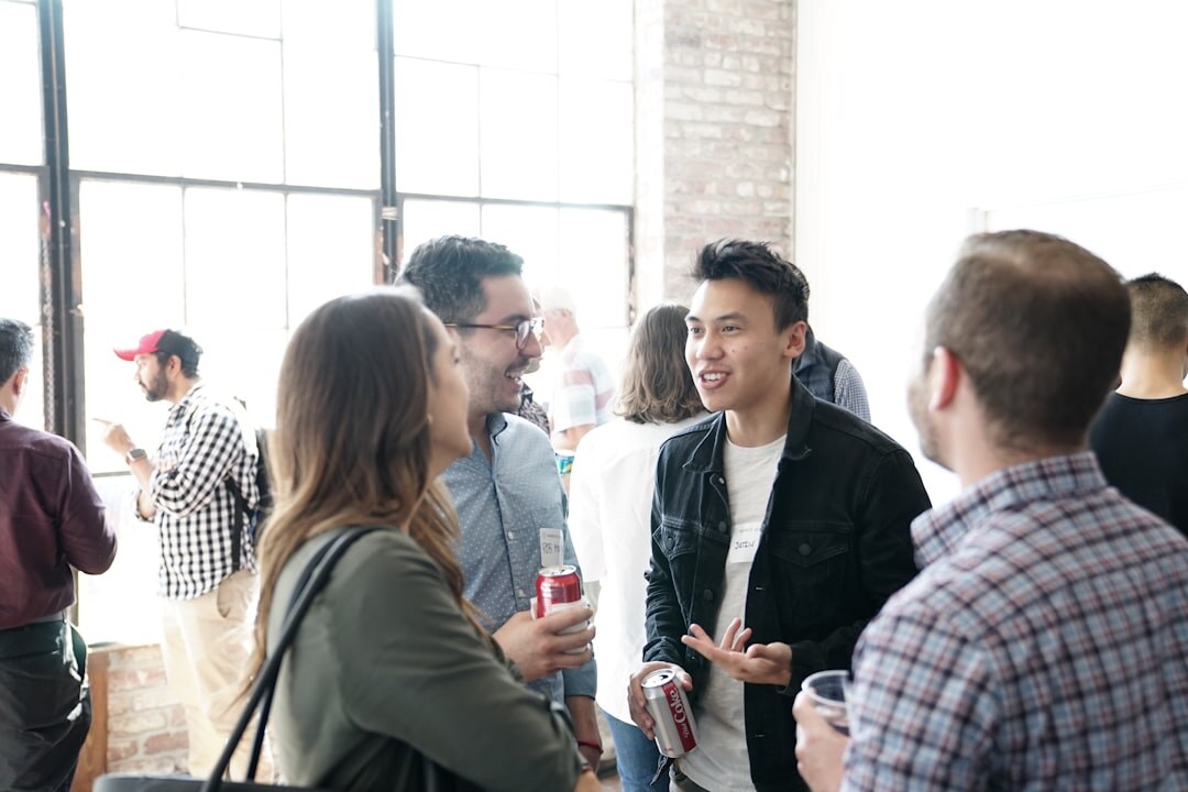 Business professionals shaking hands at a networking event